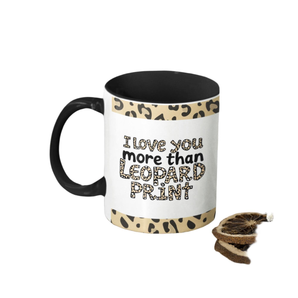 A ceramic mug with a bold leopard print design and the phrase &quot;I love you more than leopard print&quot; – the perfect gift for tea and coffee lovers.