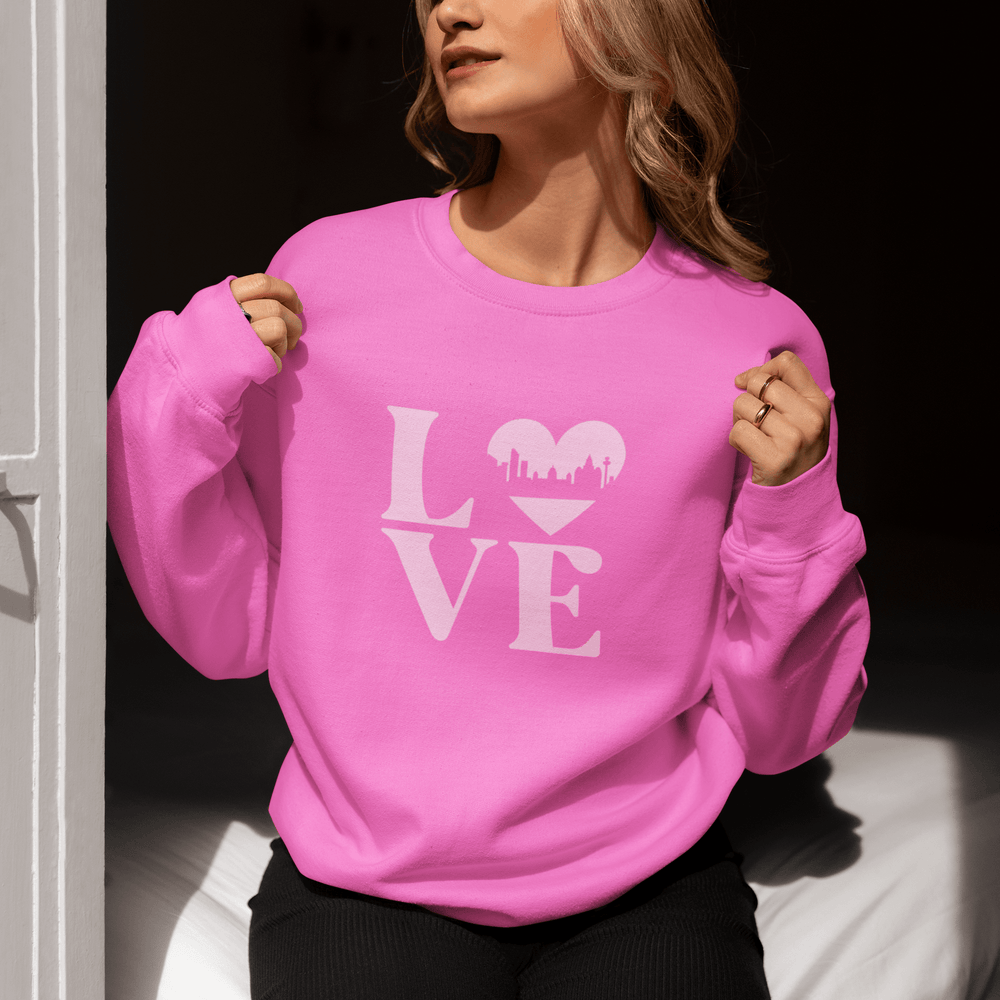 
                  
                    A pale pink Liverpool Love sweatshirt featuring the word LOVE, with a heart-shaped Liverpool skyline design – the perfect Liverpool gift or souvenir.
                  
                