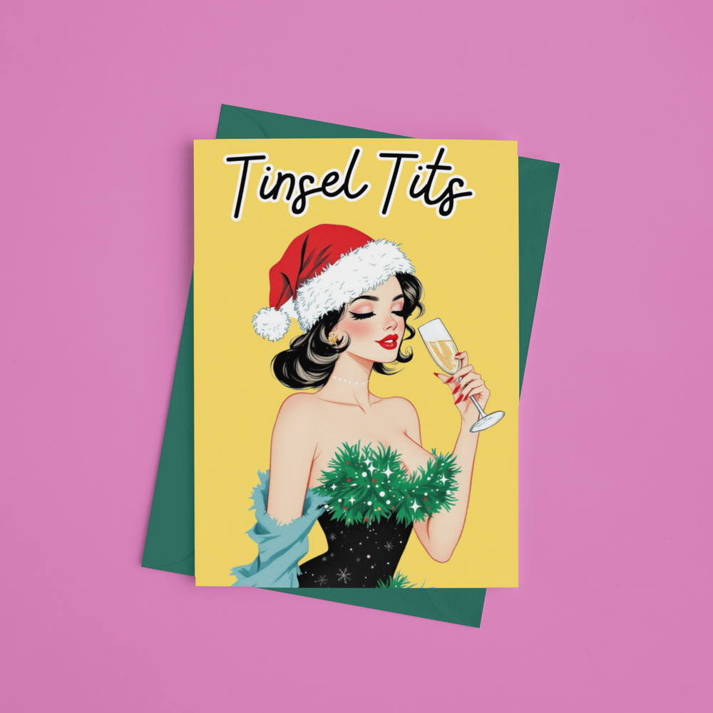 christmas card saying tinsel tits featuring a vintage woman drinking champagne with a chest covered in tinsel